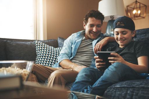 dad with son on tablet