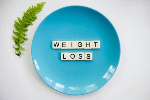 plate with letters spelling weight loss